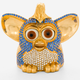Illustration for article titled A24 is auctioning off film props, including that iconic bejeweled Furby from iUncut Gems/i